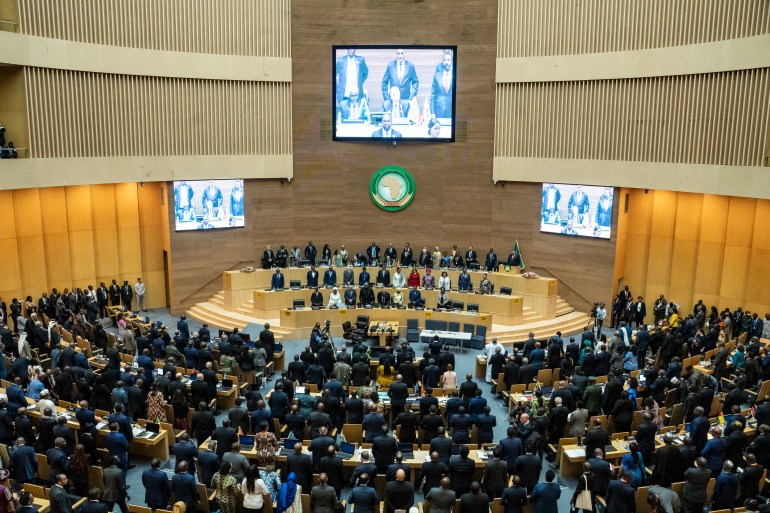 Heads of states and delegates stand for national anthems during the 38th African Union (AU) Summit, where leaders will elect a new head of the AU Commission, at the AU Headquarters in Addis Ababa on February 15, 2025. (Photo by Amanuel Sileshi / AFP)