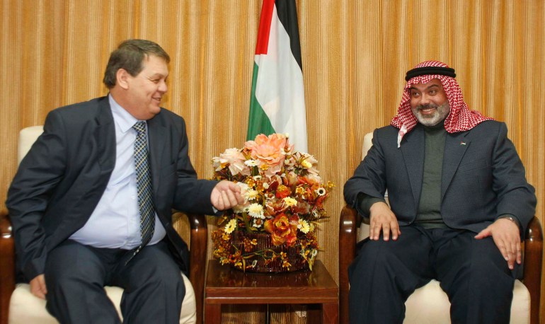 Palestinian Prime Minister Ismail Haniyeh (R) meets with Rawhi Fattouh, special representative of Palestinian President Mahmoud Abbas, at his office in Gaza January 29, 2007. REUTERS/Suhaib Salem (GAZA)