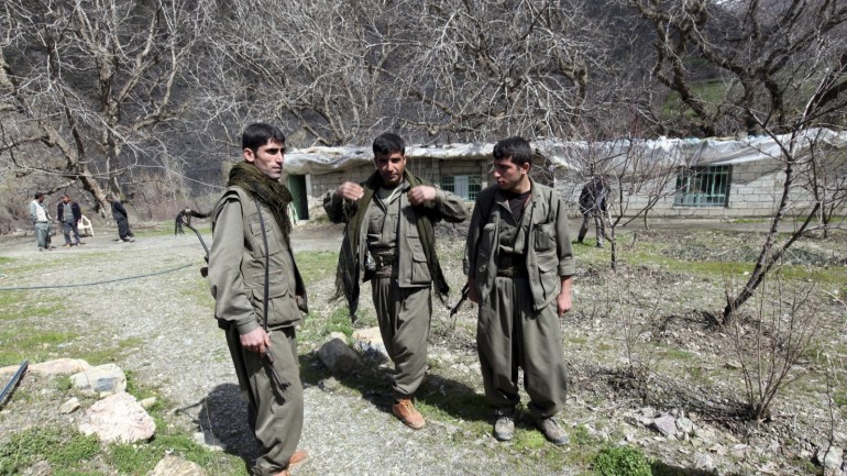 Kurdistan Workers Party (PKK) fighters stand guard at the Qandil mountains near the Iraq-Turkish border in Sulaimaniya, 330 km (205 miles) northeast of Baghdad March 24, 2013. Shattered stone houses recall Turkish air strikes on Kurdish rebels holed up in the Qandil mountains of northern Iraq. Life is harsh amid the snowcapped peaks, supplies are sparse and armed forays across into Turkey perilous in the extreme. Yet rebel chief Abdullah Ocalan, who declared a ceasefire