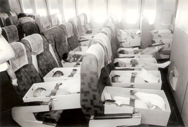 Babies airlifted out of Saigon were placed in file boxes which were strapped to the seats of the plane [Courtesy Frederick Burkle]