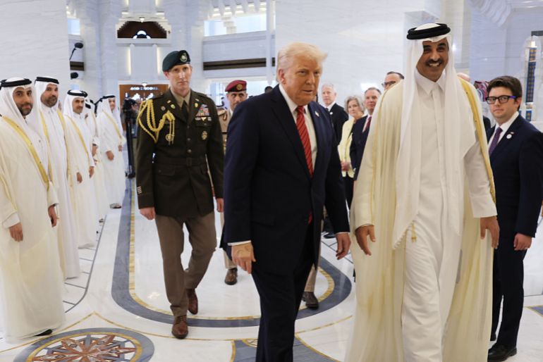 بالصور.. كيف استقبلت الدوحة الرئيس ترامب؟ 5 DOHA, QATAR - MAY 14: U.S. President Donald J. Trump participates in an arrival ceremony with Emir of Qatar Tamim bin Hamad al Thani at the Amiri Diwan, the official workplace of the emir, on May 14, 2025, in Doha, Qatar. The visit underscores the strategic partnership between the United States and Qatar, focusing on regional security and economic collaboration. (Photo by Win McNamee/Getty Images)
