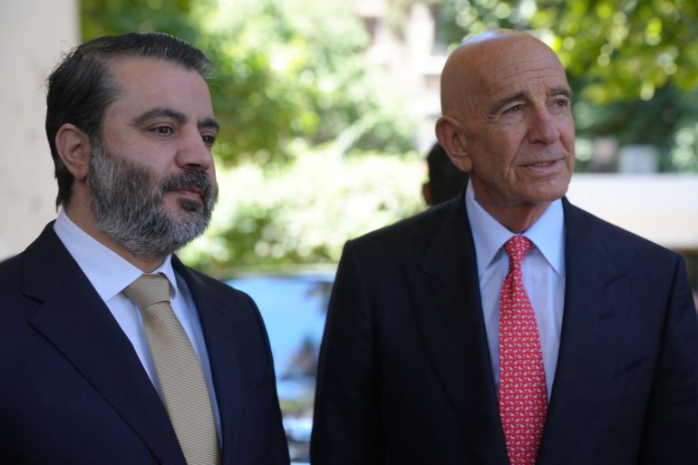المبعوث الأميركي: ترامب سيرفع سوريا من قائمة الإرهاب 1 Syria's Foreign Minister Assaad al-Shibani and US special envoy for Syria, the ambassador to Turkey Thomas Barrack (R), attend a flag-raising ceremony at the US ambassador's residence in Damascus on May 29, 2025.