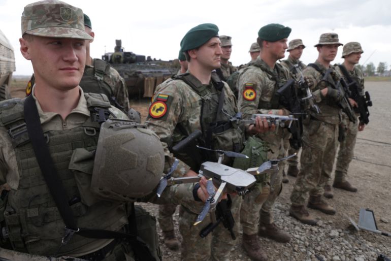 أوروبا تخوض سباق حواجز لإعادة التسلح 3 PABRADE, LITHUANIA - MAY 29: Lithuanian troops stand with their DJI drones at the Quadriga military exercises involving German, French, Dutch and Lithuanian troops during a Distinguished Visitors' Day on May 29, 2024 near Pabrade, Lithuania. Quadriga is the final part of Steadfast Defender, a series of military exercises of the NATO alliance that has been taking place mostly in northern and eastern Europe and has involved 90,000 troops with thousands of vehicles. (Photo by Sean Gallup/Getty Images)
