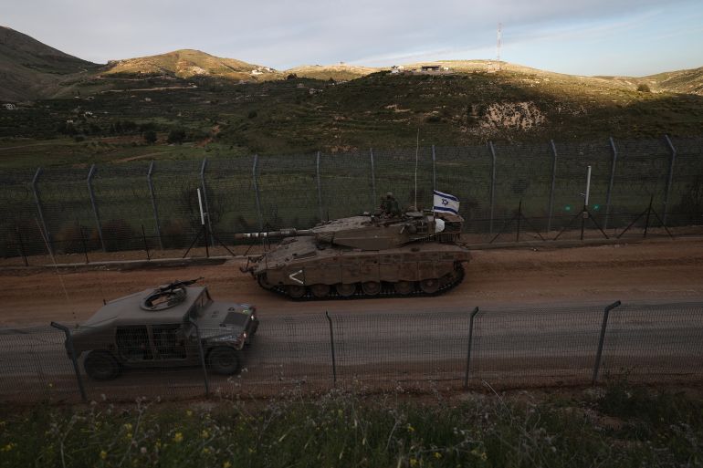 التفكيك ونشر الفوضى خيار إسرائيل بسوريا بدل التطبيع معها 2 epa12084273 Israeli Merkava tanks roll past the ceasefire line, on their way to the buffer zone between Israel and Syria near the village of Majdal Shams in the Israeli-annexed Golan Heights, 08 May 2025. The Israeli army reported that it has begun operating a mobile forward facility for triaging the wounded in southern Syria, in the area of the village of Hadar. EPA-EFE/ATEF SAFADI