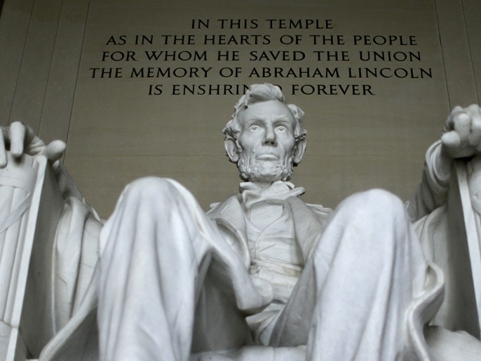 من المهربين إلى الخونة.. 10 قرارات عفو رئاسية مدهشة في تاريخ أميركا 2 U.S. President Abraham Lincoln's statue at the Lincoln Memorial is seen in Washington March 27, 2015. The 170 ton, 19 foot high statue, formed from 28 blocks of Georgia marble, was sculpted by Daniel Chester French and dedicated in 1922. On April 15 the United States commemorates the 150th anniversary of President Abraham Lincoln's assassination. Events will include the re-enactment of his funeral in Springfield, Illinois, as well as talks and plays at Ford's Theatre in Washington D.C., where Confederate sympathiser John Wilkes Booth shot him in 1865. Lincoln, who kept the Union together in the American Civil War and helped secure the end of slavery, has enduring appeal both in the United States and worldwide: his life is celebrated at the Lincoln Memorial in Washington D.C., five-dollar bills carry his image and Stephen Spielberg directed the 2012 film bearing the 16th president's name. REUTERS/Gary CameronPICTURE 7 OF 30 FOR WIDER IMAGE STORY 'MEMORIES OF LINCOLN'SEARCH '150TH ASSASSINATION' FOR ALL IMAGES