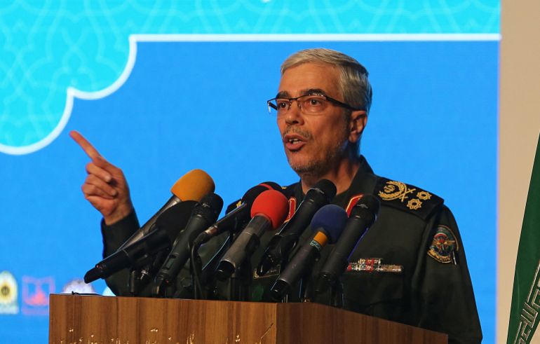 أبرز القادة العسكريين والعلماء الإيرانيين الذين استهدفهم الهجوم الإسرائيلي 1 (FILES) Iranian Armed Forces Chief of Staff Major General Mohammad Bagheri speaks during the the International Conference on the Legal-International Claims of the Holy Defense in the capital Tehran on February 23, 2021.